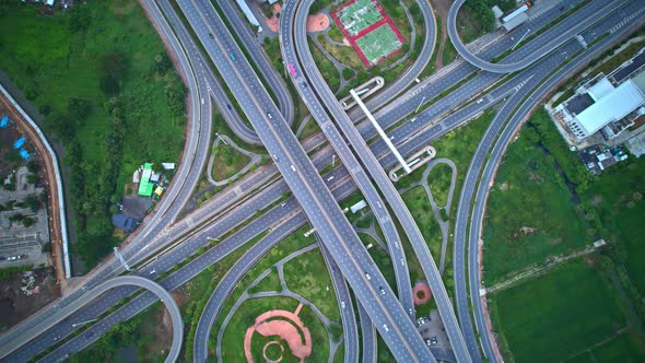 Drone flying over interchange and multi junction road