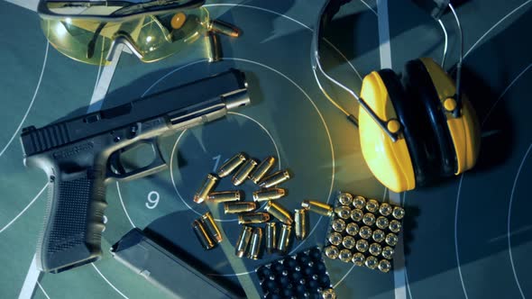 Special Equipment Guns, Weapons, Rifles on a Table at a Shooting Gallery, Close Up. alt