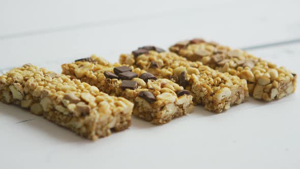 Granola Bars with Dried Fruits Wooden Background