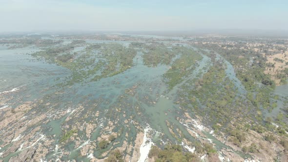 Aerial: flying over Don Det and the 4000 islands Mekong River in Laos