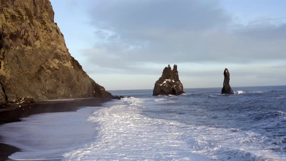 Reynisdrangar Columns and the Black Sand Beach in Iceland