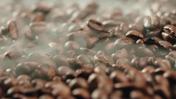 Coffe Beans Falling Down in the Oven for Roasting Process Smoke Coming Out