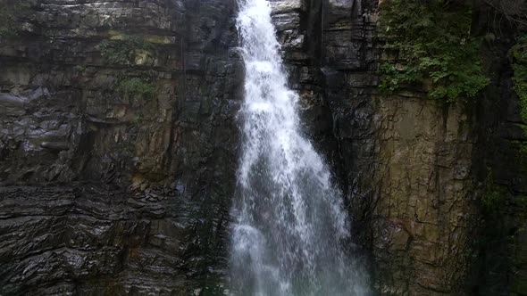 View of Waterfall in Mountains Forest