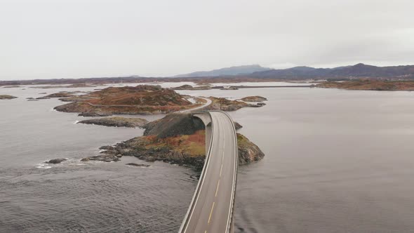 Calm Aerial View of Storseisundet Bridge On A Foggy Day in Norway. - Drone shot