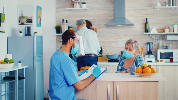 Senior Woman Listening Doctor