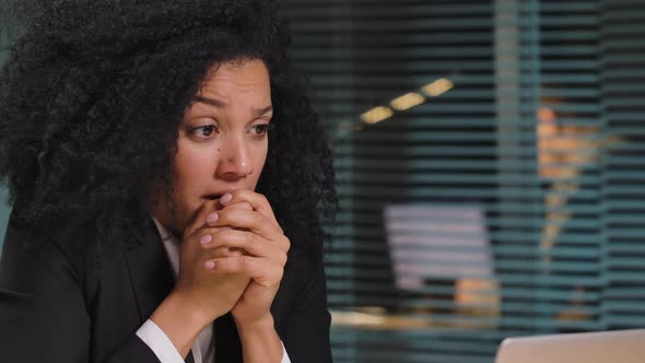 Portrait of African American Woman Talking Excitedly on a Video Call on a Laptop