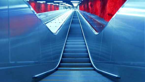 Pedestrian Escalator Goes Endlessly Without People. Automatic Stairs Moving Up 