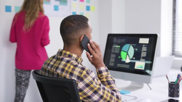 Man and woman working at the office