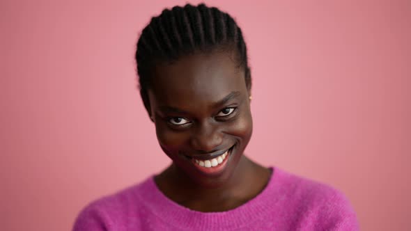 Smiling woman volunteer showing okay sign at the camera