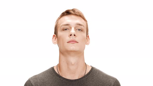 Nervous Young Handsome Man Calm Down Over White Background