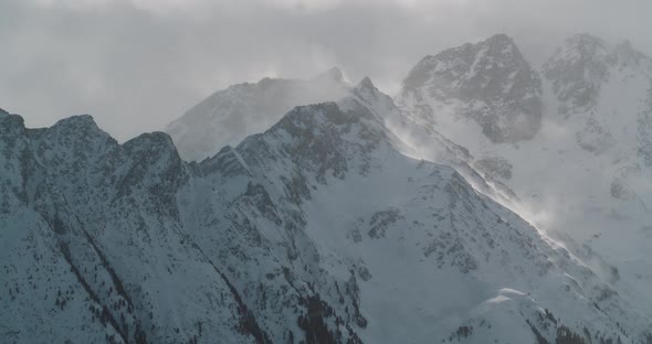 Mountain time lapse with clouds rolling over the peak. Magical fog. Zillertal, Austria