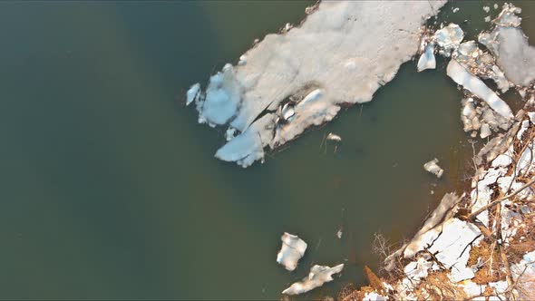 Ice Drift on the River in Early Spring of Ice Float Down the Stream