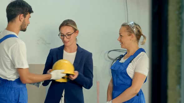 Smile and Happy Group of Architects and Engineers at a Building Site alt