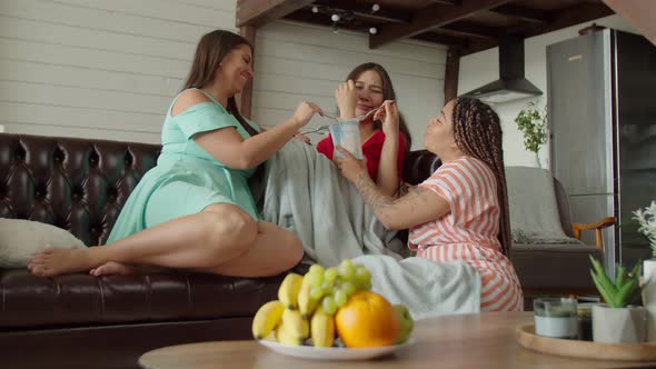 Young Beautiful Woman Sharing Problem with Multiracial Friends at Home