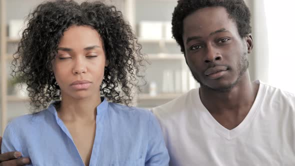 Serious Young African Couple