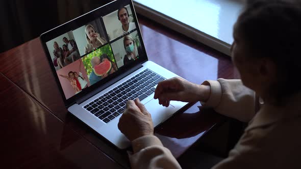 Senior Woman Make Video Call Using Laptop at Home