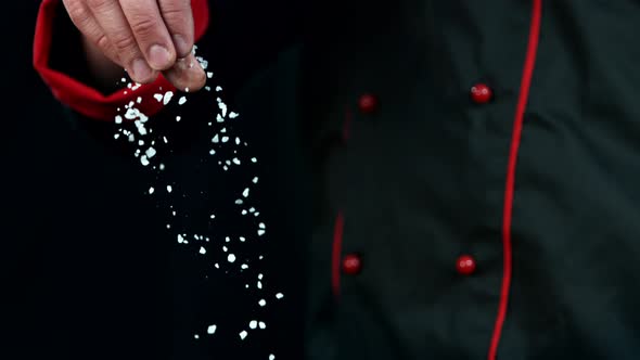 Super Slow Motion Shot of Chef Adds Salt Into Dish at 1000Fps.