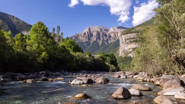 Clouds Passing Over Monte Pedido Mountains and River