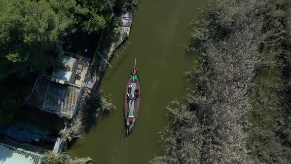 Aerial Drone Footage of a Boat with Tourists on It to Visit the Natural Park of the Albufera in