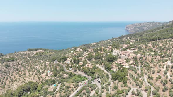 Aerial view of Valdemossa city with the sea in the background in Mallorca Island, Spain