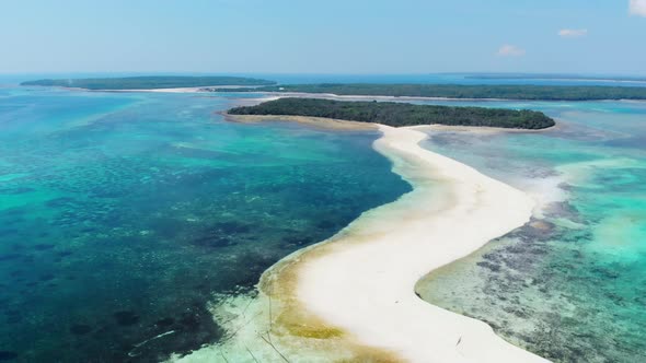 Aerial: tropical beach island reef caribbean sea white sand bar Snake Island, Indonesia Maluku