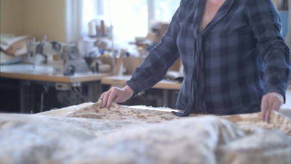 Fashion designer working in her studio