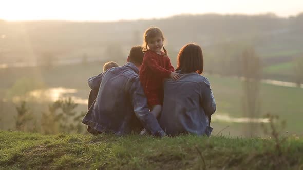 Family on vacation for a picnic with a fire