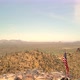 American US Flag on Top of Desert Mountain Flyby - VideoHive Item for Sale