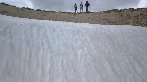 Tourists on a Pass in the Alps