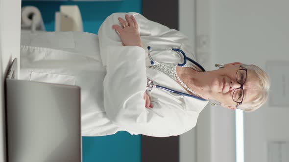 Vertical Video Portrait of Female Doctor with Medical Expertise Feeling Confident