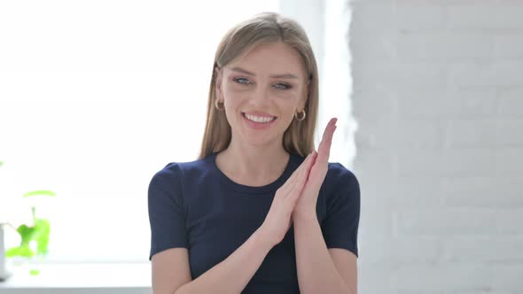 Portrait of Happy Woman Clapping Applauding