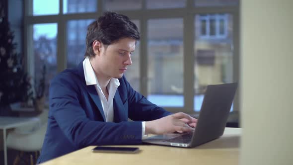 Handsome Entrepreneur Chatting Online