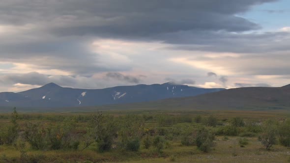 Clouds Move Quickly Over Mountain