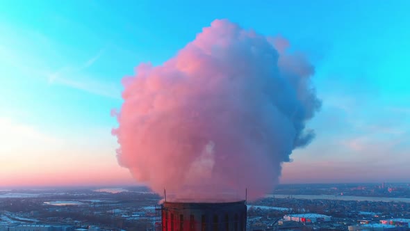 Factory Pipes Pollution in Air at Sunset Close Up