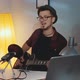 Home Recording Studio: Cheerful Musician Playing Guitar and Emotionally Singing His Hit Song - VideoHive Item for Sale