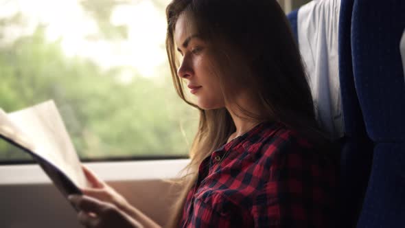 Young Pretty Girl Travelling By Modern Train