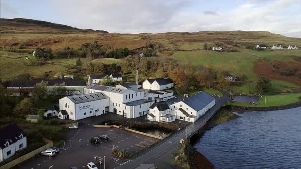 Flying Towards a Scottish Distillery in the Village of Carbost in Skye