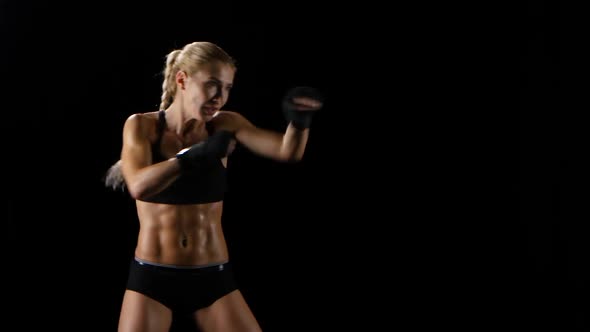 Sports Training Women Boxer. Quick and Precise Blows