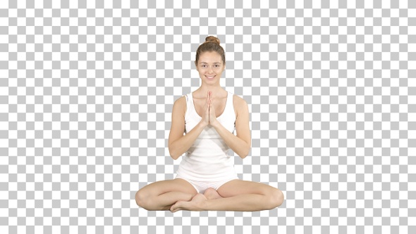 Beautiful Woman Sitting without Yoga Mat in Lotus Pose Alpha