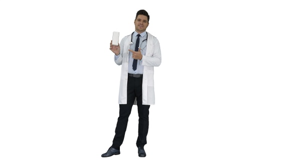 Mature doctor in whitecoat describing new pills in box