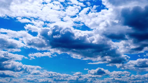 Timelapse of Cumulus Clouds Moving in the Blue Sky Cloud Space