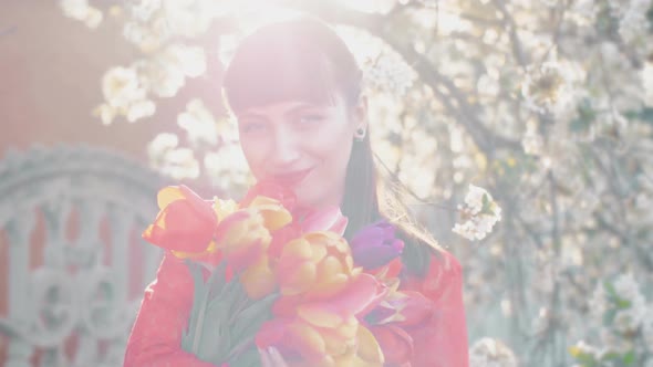 Woman with Flowers in Springtime