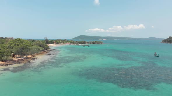 Shallow coast of M'pai Bay, with clean turquoise warm water surrounding Koh Rong Sanloem island