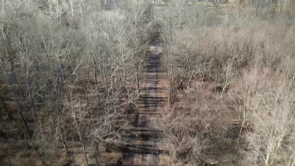 Aerial footage of a trail that leads to a creek