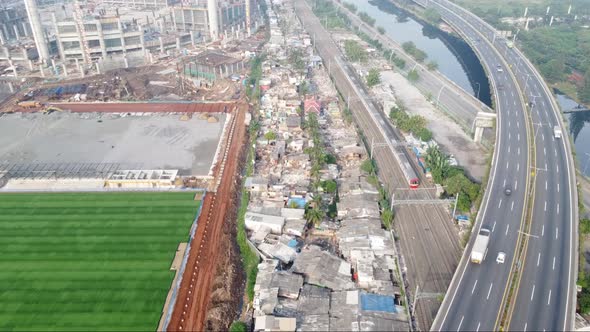 Foggy aerial view of the construction of a football stadium