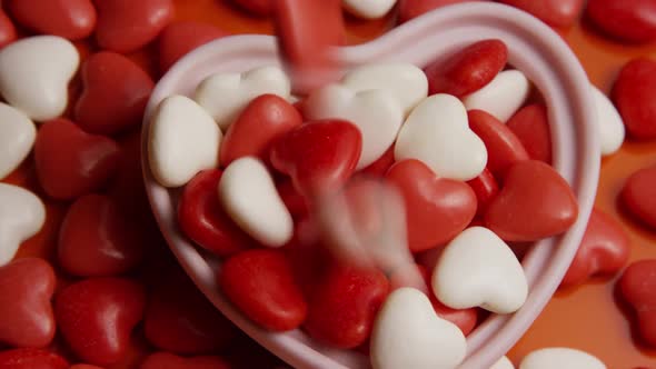 Rotating stock footage shot of Valentines decorations and candies - VALENTINES 0077