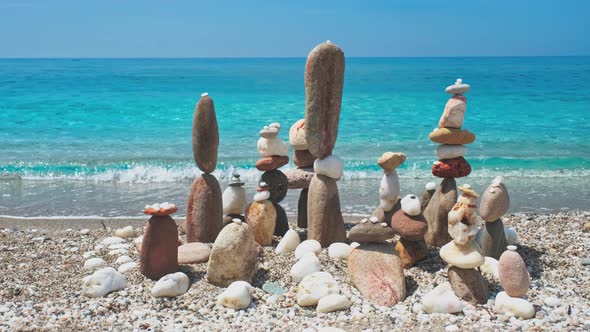 Concept of Balance and Harmony. - Stone Stacks on the Beach