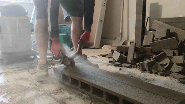 The Workman Cutting Concrete Blocks By Diamond Circular Saw Blade