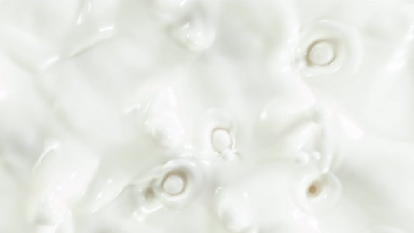 Super Slow Motion Shot of Swirling Fresh Cream at 1000Fps