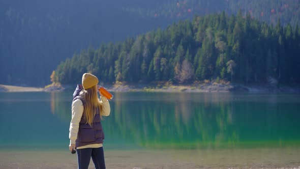 A Young Woman Visits the Crno Jezero or the Black Lake Near the City of Zabljak